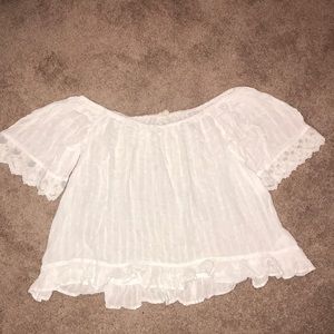 A cropped top shirt/cover up